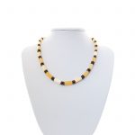 amber-necklace-cylinder-buttons-front