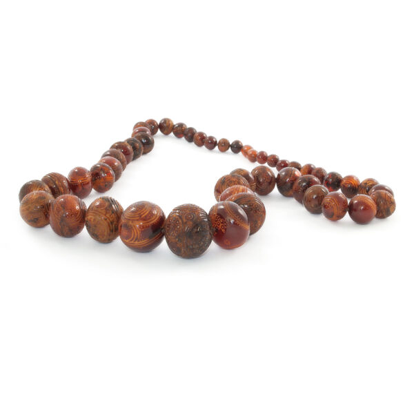 amber-necklace-embossed-buttons amber-necklace-embossed-buttons