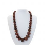 amber-necklace-embossed-buttons-front