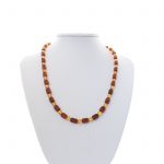 amber-necklace-faceted-barrels-cognac-front