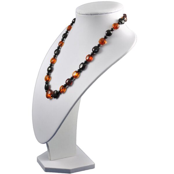 amber-necklace-faceted-dark-cognac-left-e1525956848151.jpg