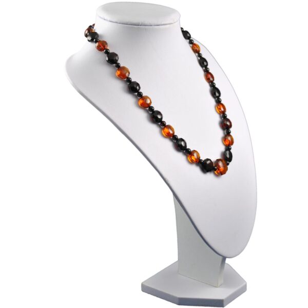 amber-necklace-faceted-dark-cognac-right-e1525956876744.jpg