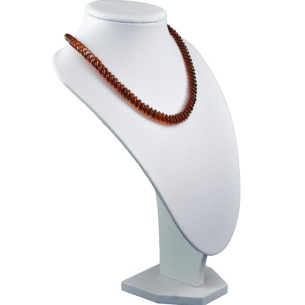 amber-necklace-tablets-cognac-right-e1525958767268.jpg