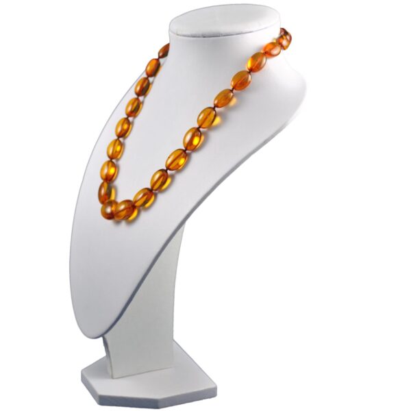 anber-necklace-cognac-beans-left-e1525955343222.jpg