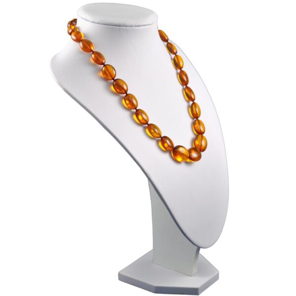 anber-necklace-cognac-beans-right-e1525955368236.jpg